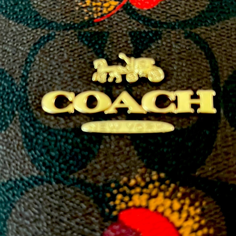 Coach brown tote red flower print new never used received as gift